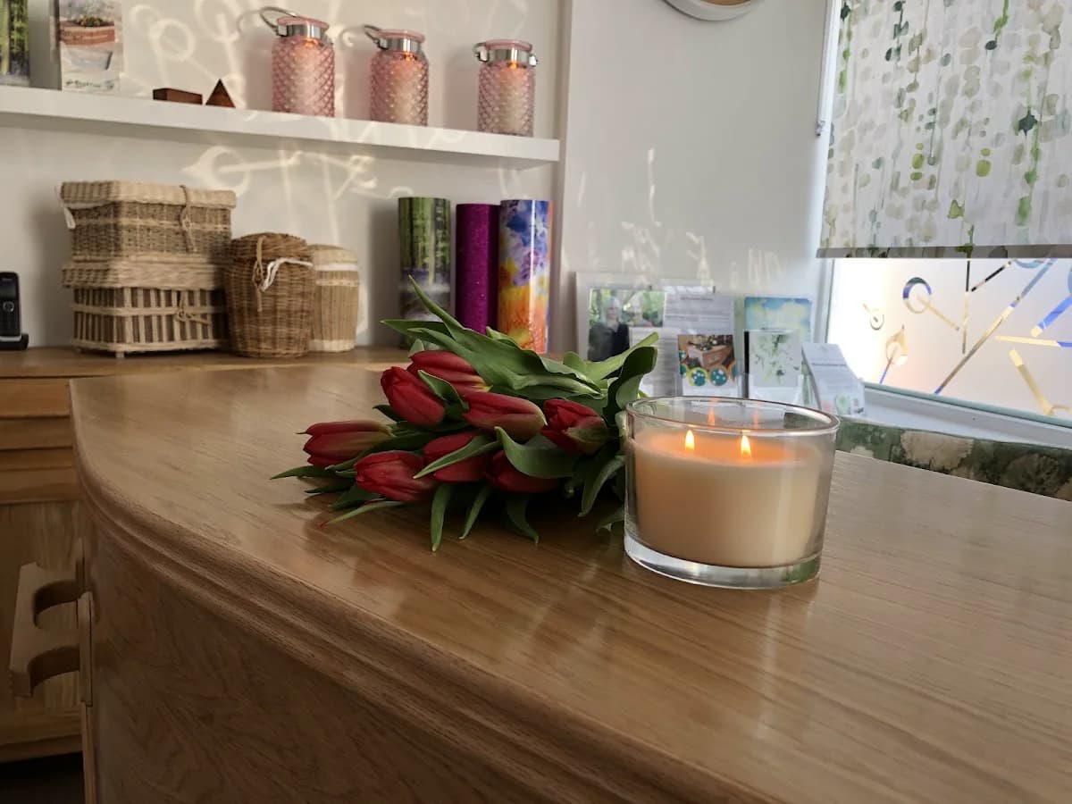 A Natural Undertaking reception with flowers and candles