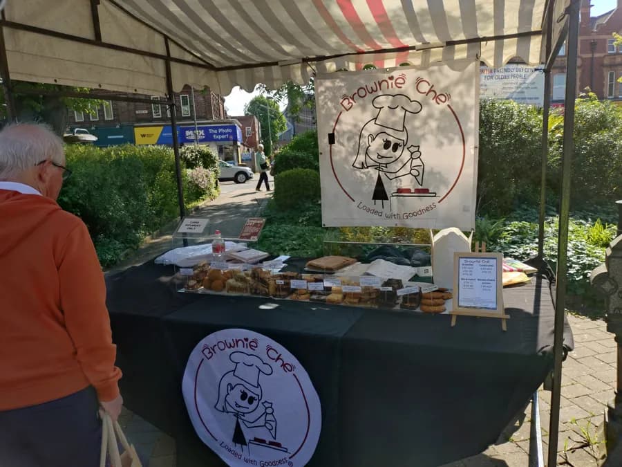 Brownie Che bakes stall with brownies, cookies and cookie pies
