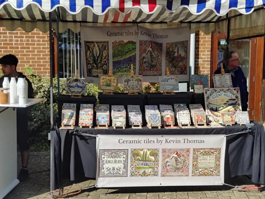 Ceramic Tiles by Kevin Thomas stall showing decorative local-landmark tiles