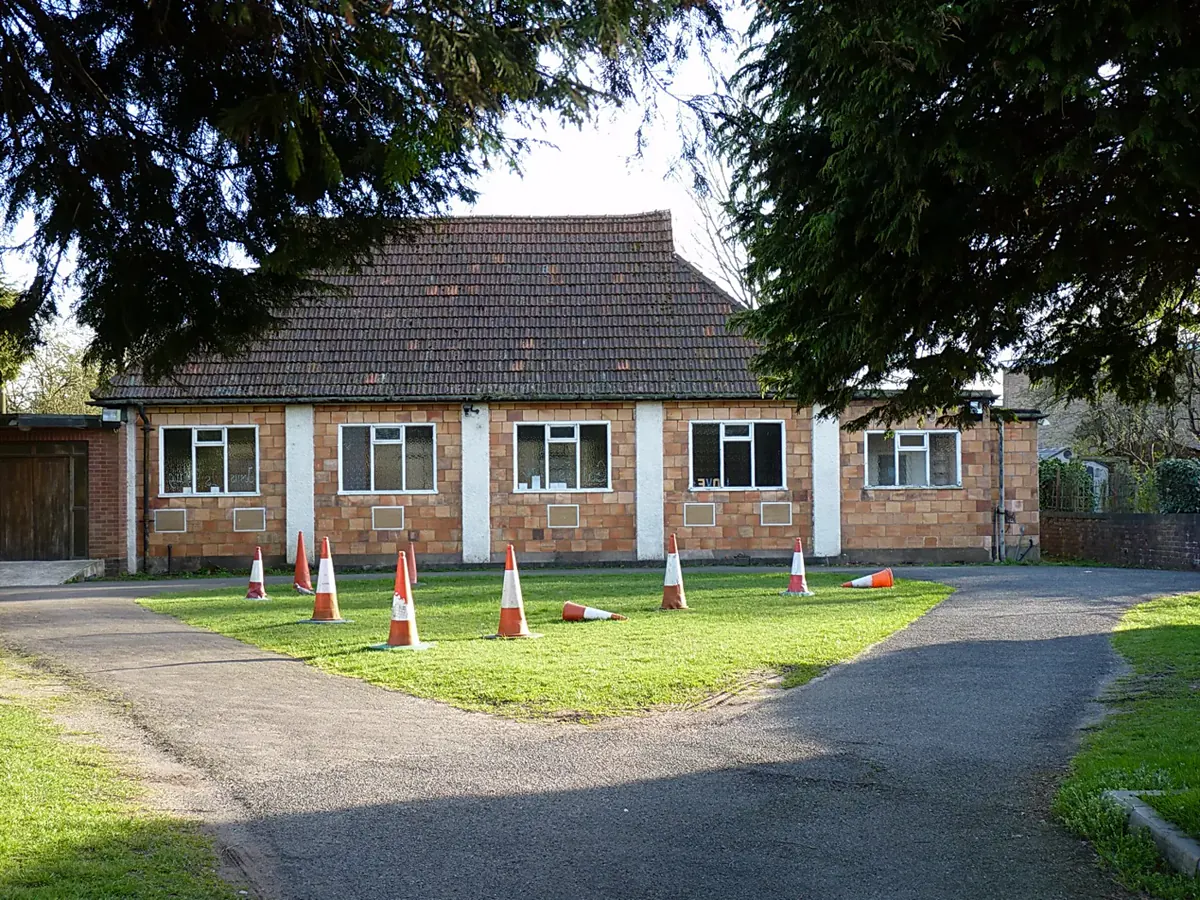 AFB Brook Lane church building viewed through the grounds