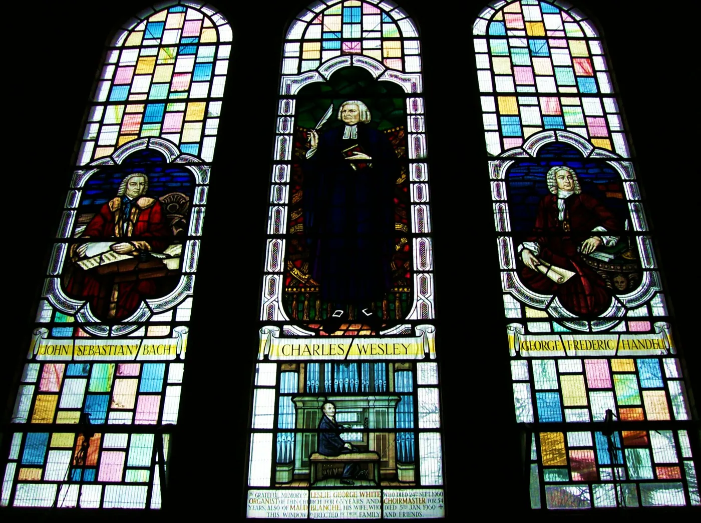 Musicians memorial stained-glass window inside All Saints Church