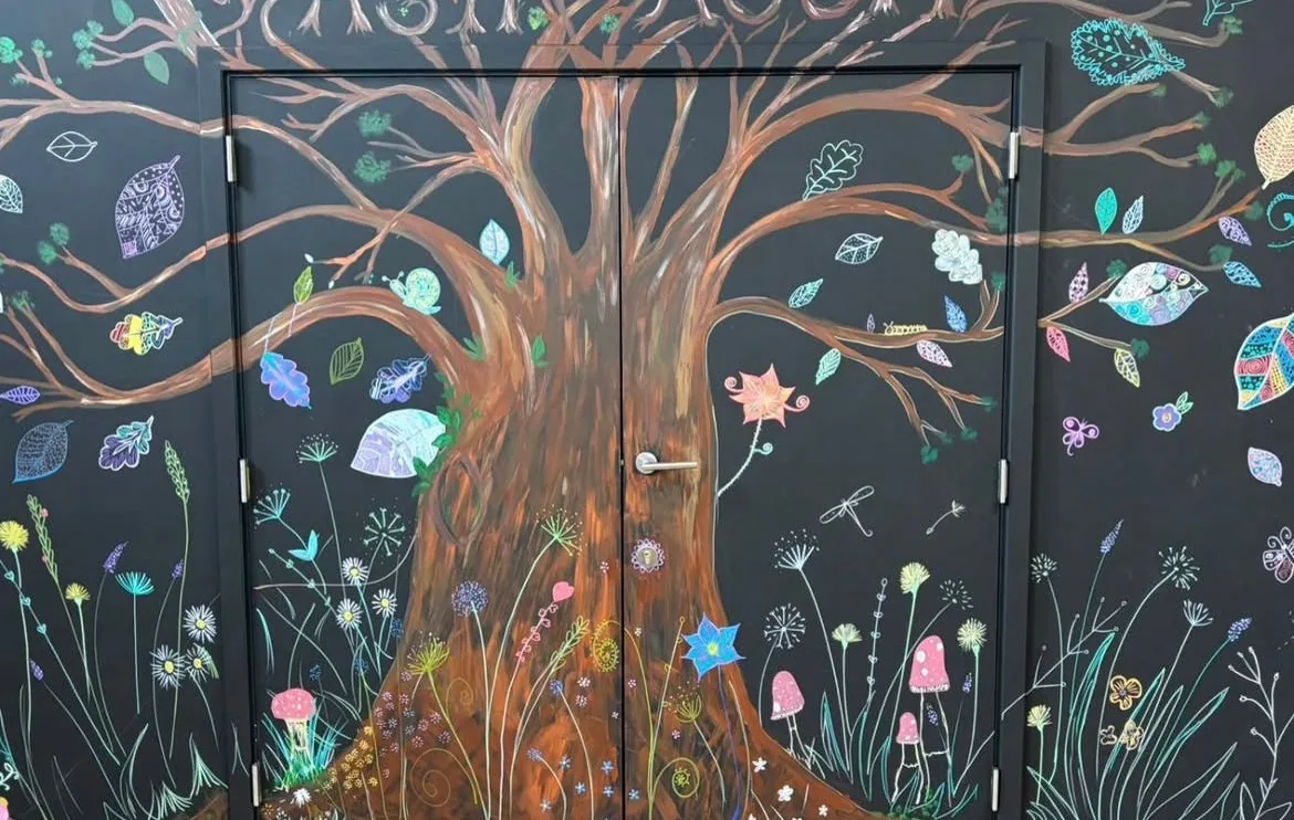 A colourful nature mural created during an All Saints youth project