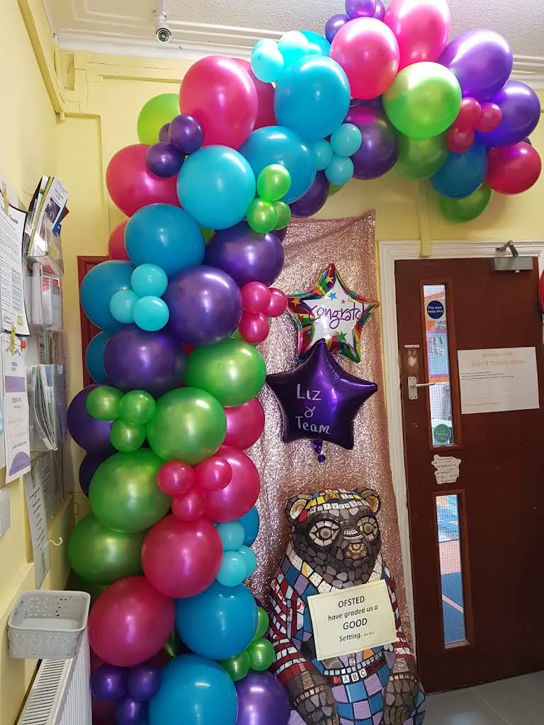 Colourful balloon arch created by Balloon Away