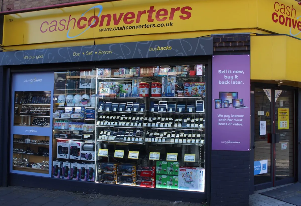 Technology, jewellery and toys displayed in the Cash Converters Kings Heath window