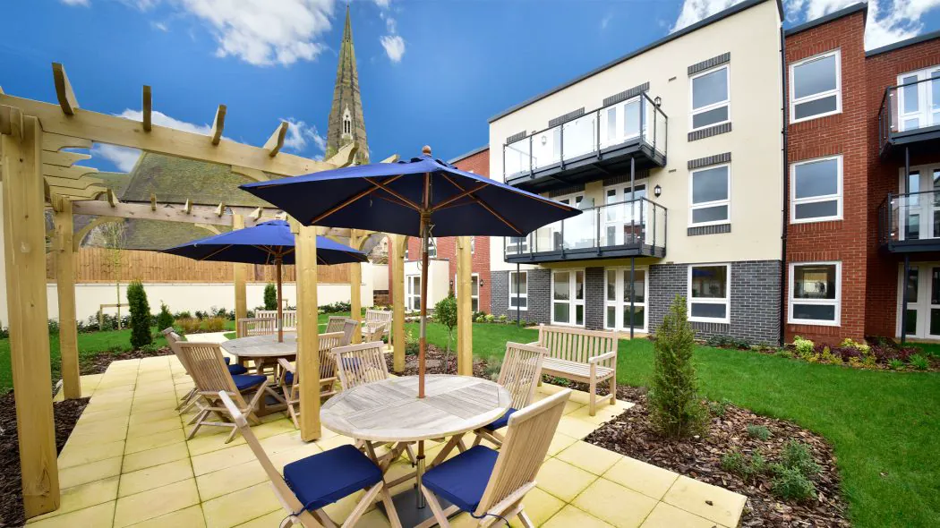 Landscaped garden and patio at Highbury Lodge
