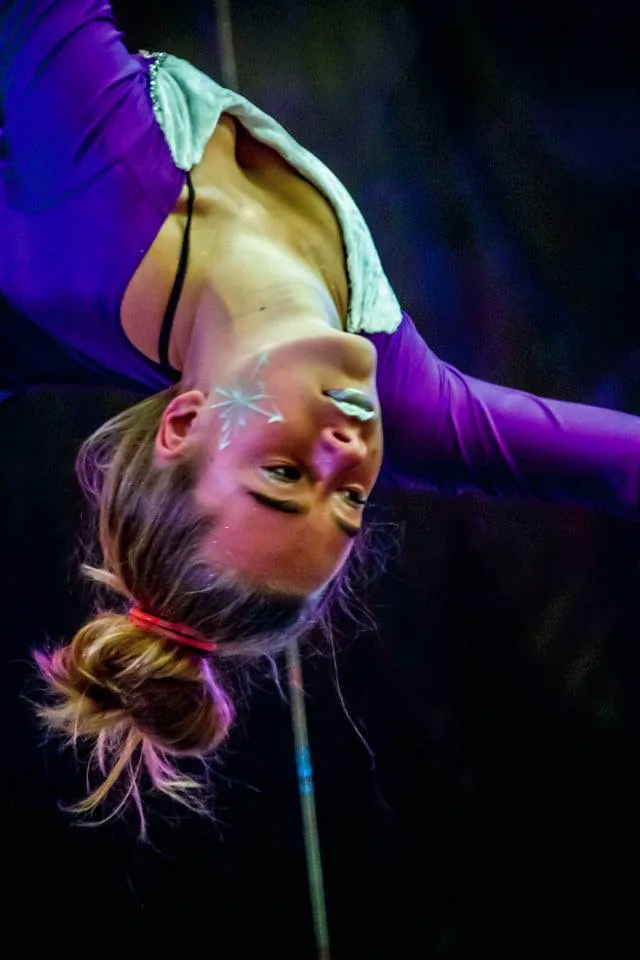 A CircusMASH aerial artist performing upside down