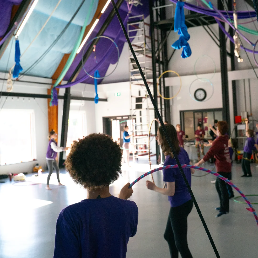 A CircusMASH youth hoop workshop inside the training space