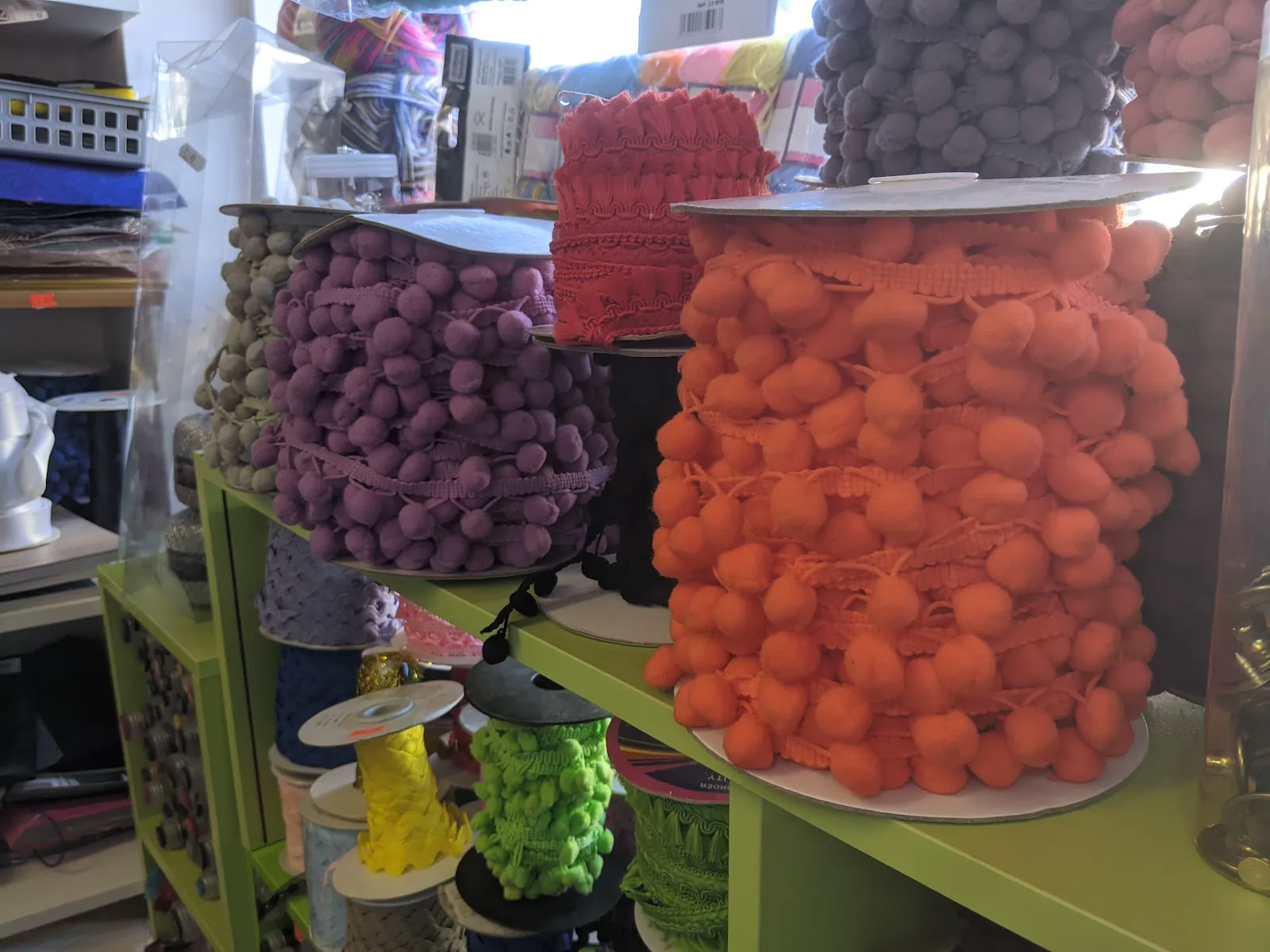 Colourful pompoms and craft trimmings in the York Road shop