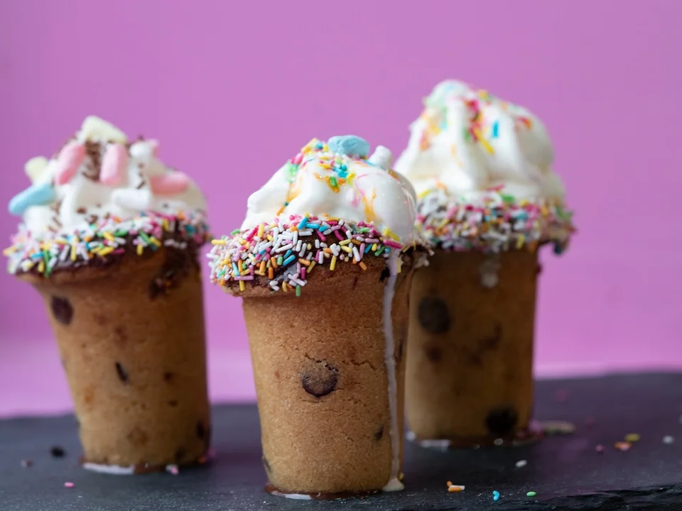 Ice cream and sweets served in cookie cups by Ever So Sweet