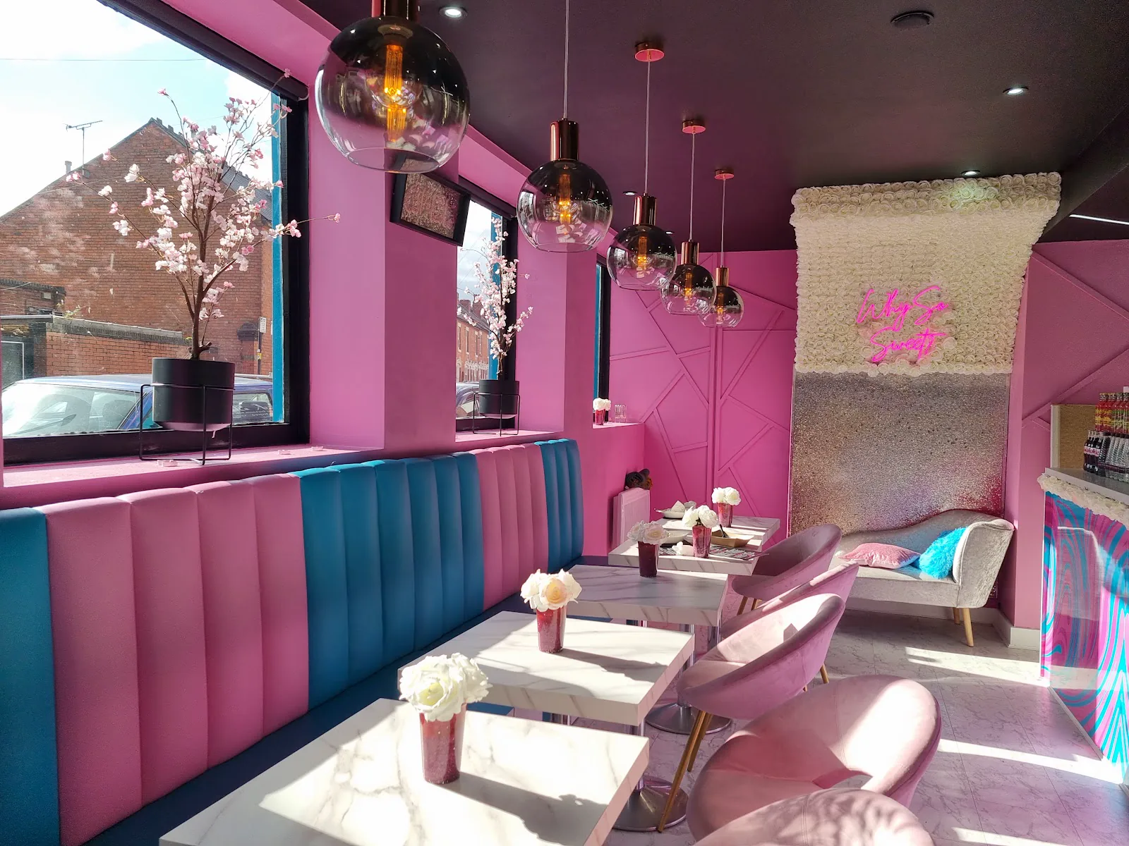 Pink and blue seating inside Ever So Sweet