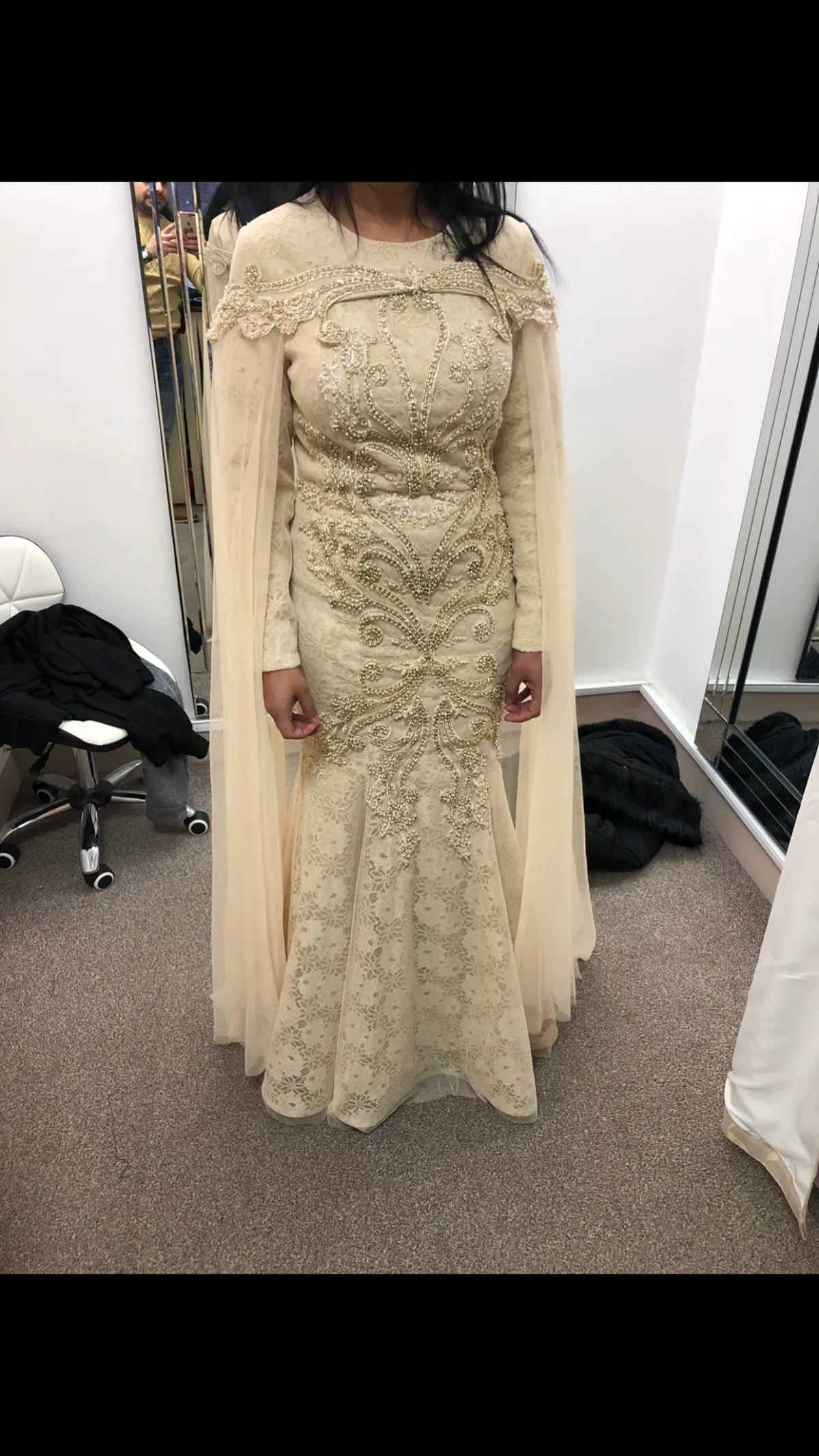 Embroidered formal dress alteration by H & J Stitch