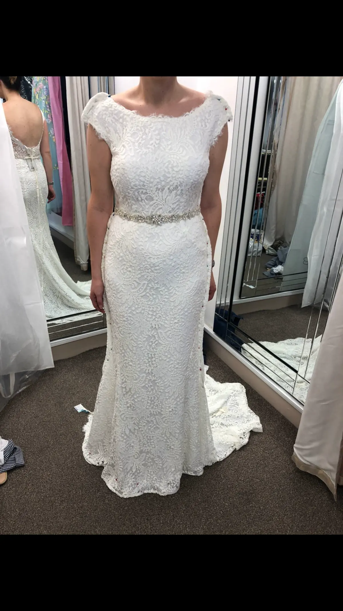 Fitted wedding dress altered by H & J Stitch