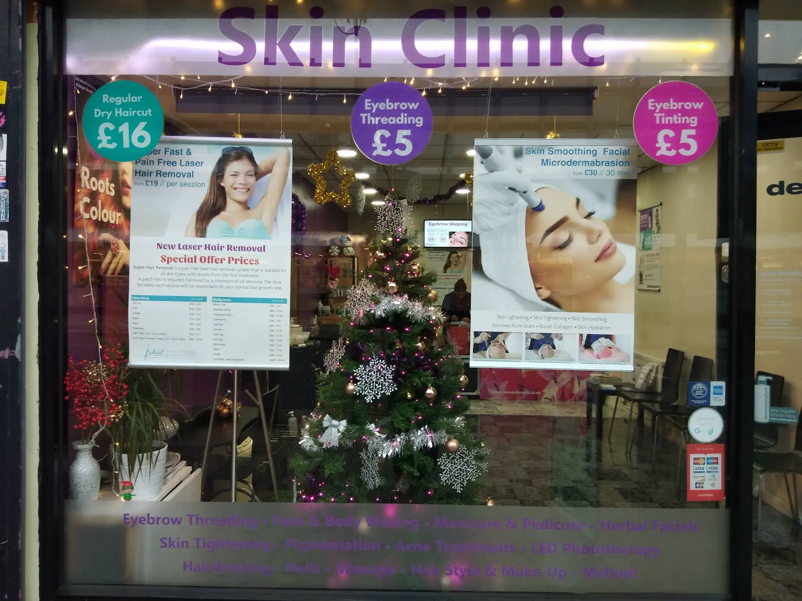 Hemaxi Beauty's Kings Heath salon window and treatment displays