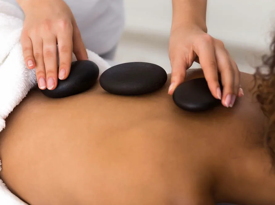 Hot stone massage treatment offered by Respa Beauty