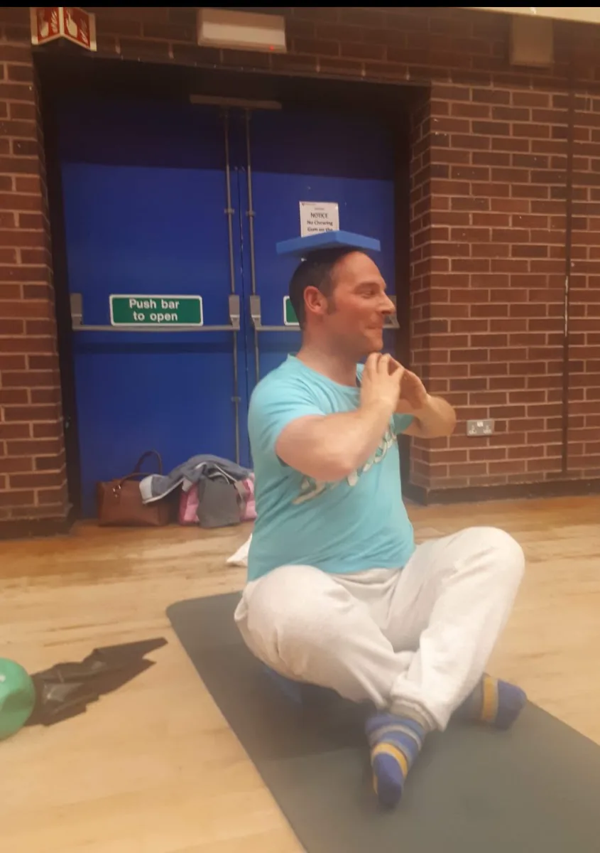 Respira Pilates Birmingham instructor demonstrating an exercise
