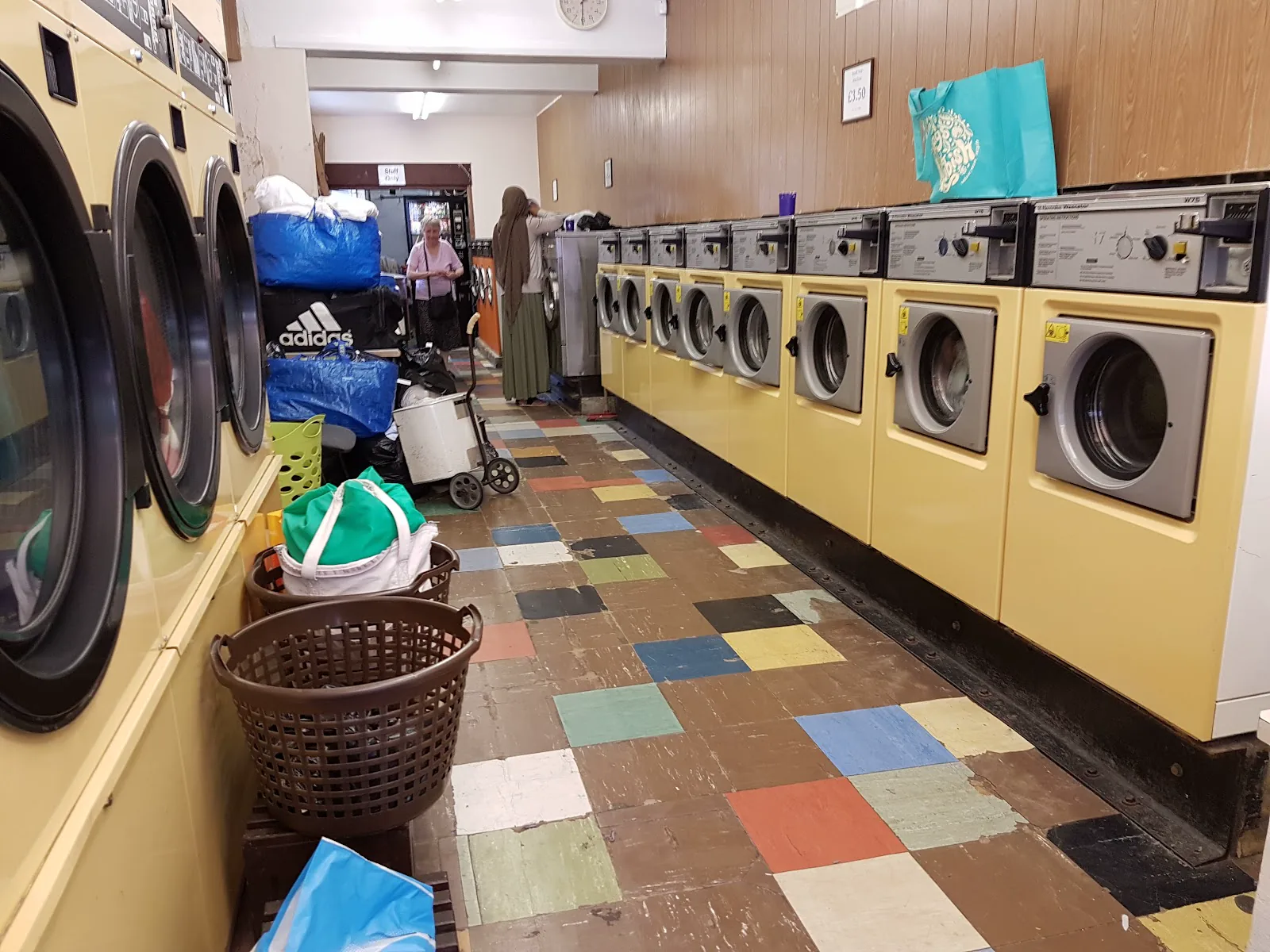 Rows of washing machines inside Swift Launderette