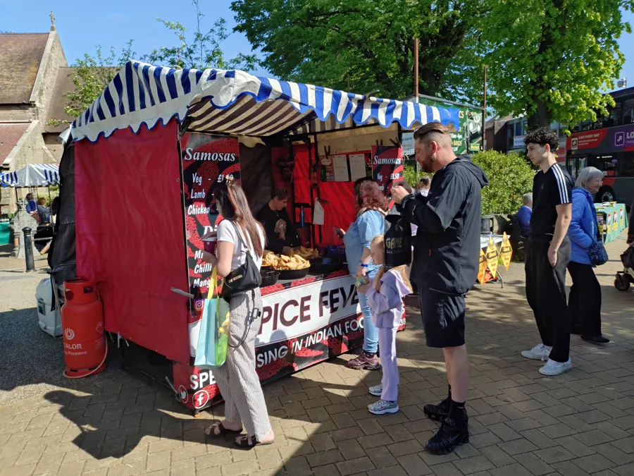 Spice Fever Indian street-food stall serving samosas at the Farmers’ Market